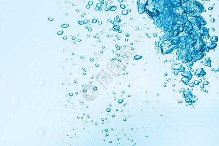 蓝色水底泡泡流动宏观海浪液体波纹白色水滴气泡图片