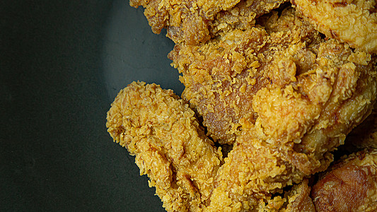 美国炸鸡特写了食物内容的图像美食薯条家禽垃圾午餐营养面包屑油炸土豆掘金图片