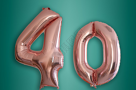 以40号形状的孤立粉红色金色Hellium气球数字空白纪念日营销流光绿色反光周年金子庆典图片