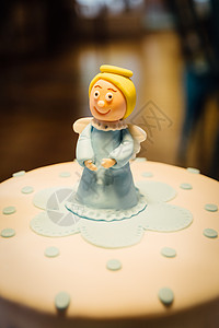 天使蛋糕蛋糕上的糖糊天使背景