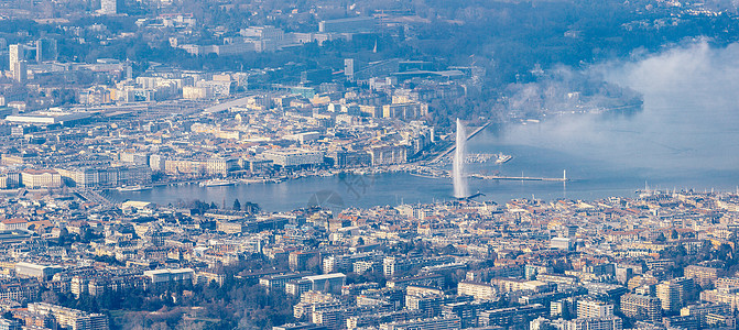 城市雾日内瓦市中心航空全景城市鸟瞰图喷泉天线季节薄雾风景多云背景