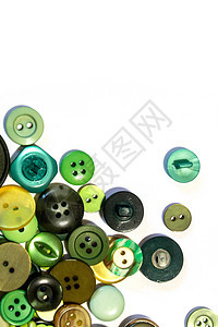 多色不同尺寸按钮的集合收藏绿色工艺纺织品缝纫黄色维修白色塑料衣服图片