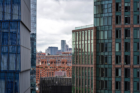 现代写字楼和住宅楼的特写反射景观建筑学商业首都蓝色窗户办公室中心建造图片