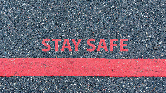 带有红线和文字的沥青路顶端视图警告社会传染性地面预防感染边缘风险街道红色图片