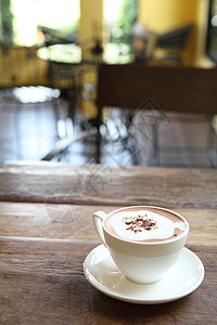 热巧克力肉桂星星香草饮料桌子咖啡液体宏观可可杯子图片