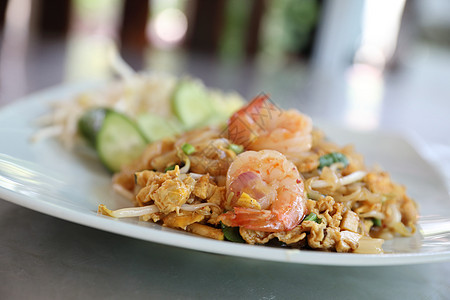 面条和上面有虾 泰国食物豆芽餐厅美食坚果柠檬盘子花生海鲜烹饪胡椒图片