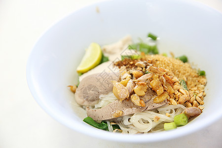 泰式泰国食用汤面面条美食蔬菜餐厅筷子饮食营养盘子早餐课程传统图片