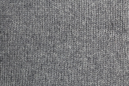 旧灰色暖毛衣质地和背景柔软度棉布工艺乡村衣服羊毛织物宏观针织材料图片