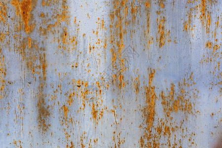 生锈的扁平固体金属板表面背景和纹理 带有白色和浅蓝色疼痛的残留物图片