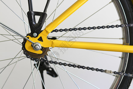 自行车链和套装系统 自行车链架子机械齿轮自行车链轮装置磁带束缚机器圆圈图片