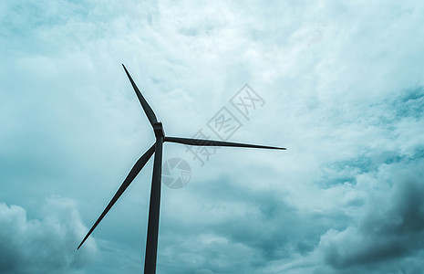 阳光照耀的清晨风力涡轮机力量螺旋桨生态技术风车云景农场转子蓝色天空图片