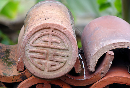 中华传统屋顶板块的装饰运气遗产陶瓷圆形瓷砖文化迷信砖块宗教魅力背景图片