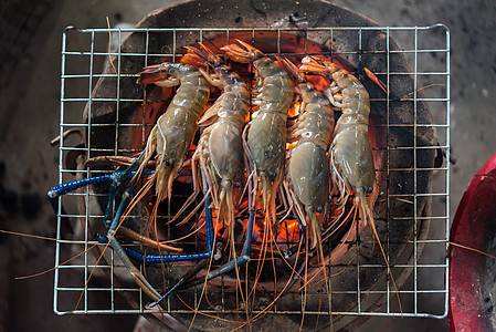 市场上的灰虾干淡水大虾街道海鲜牛扒动物烧烤海洋营养饮食食物派对图片