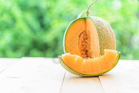 创意西瓜新鲜橙色甜瓜场地饮食植物青瓜园艺食物甜点种子温室西瓜背景