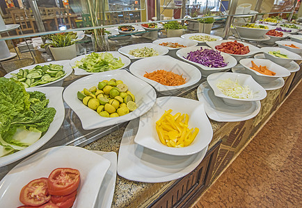 餐馆自助餐厅沙拉食品变色营养健康饮食自助餐陶器胡椒黄瓜盘子酒店沙拉台绿色图片