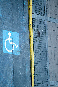 残疾人停车标志牌椅子人士车轮白色障碍城市沥青交通蓝色公园图片