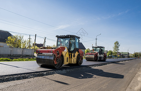 新的道路建筑工地铺设沥青路面的重振动滚滚机 修理压实振动车轮压实机装修建造车辆土壤工程装载机图片