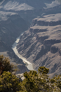 大峡谷和科罗拉多河美丽的景观沙漠峡谷橙子侵蚀公园地标悬崖轮缘天空国家图片