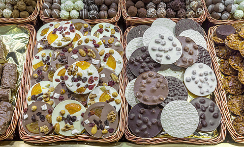 长龙和马卡松甜点坚果可可巧克力水果摊位店铺咖啡糖果旅行图片