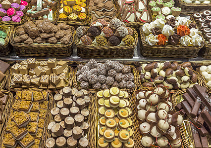 长龙和马卡松旅行店铺巧克力水果市场甜点营养糖果诱惑橙子图片