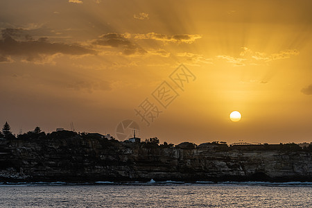 日落在澳洲悉尼市的天线上天际岩石城市悬崖图片