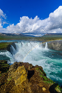 戈达福斯瀑布之景冰川戏剧性石头地标蓝色力量彩虹流动运动天空图片