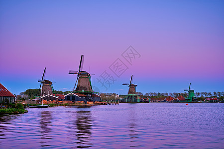 荷兰的风车在日落黄昏游客旅游天空胜地农场旅行风景历史性景点农村图片