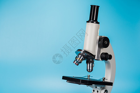 浅蓝色背景的科学显微镜健康实验样本技术医疗微生物学药品生物化学镜片图片