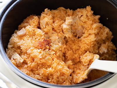 大米和火鸡肉煮在快锅里电饭煲多功能吃饭香料食谱禽肉炊具家禽图片
