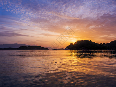 希腊勒夫卡斯岛尼德里湾日出旅行小岛太阳镍离子旅游地标村庄海湾船运胰岛图片