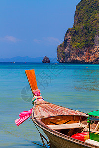 菲菲群岛安达曼海安达曼海长船和热带海滩晴天蓝色岩石海洋假期天堂支撑旅游风景娱乐图片