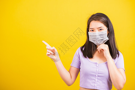 妇女戴面罩 防止冠状病毒或COVID手势感染女性手指暴发面具安全药品女士黄色图片