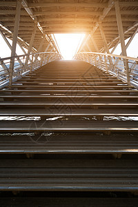 巴黎索尔费里诺桥对太阳的阶梯场景街道人行道金属建筑学中心通道小路拱门光环图片