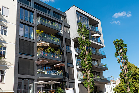 柏林的现代公寓房市场住房住宅蓝色玻璃房子房地产不动产财产公寓图片