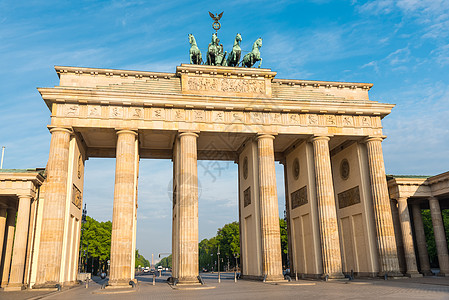 柏林勃兰登堡门太阳建筑历史性雕塑建筑学雕像纪念碑天空观光地标图片