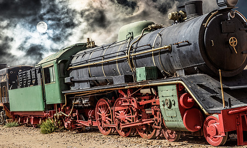 照片来自约旦Wadi Rum的蒸汽火车头 具有戏剧性背景背景图片