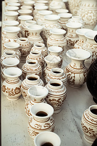 传统罗马尼亚手工陶瓷市场文化杯子盘子制品纪念品雕塑陶器工艺水壶工作图片