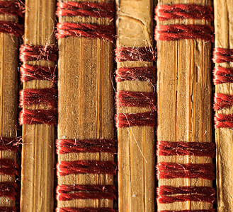 带螺纹的旧竹枝的质地材料热带栅栏墙纸植物风格装饰黄色木头宏观图片