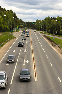 城市公路车辆场景运输速度小时城市汽车道路运动环境车道背景图片