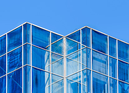 没有人的办公楼的空窗户市中心建筑玻璃蓝色框架街道几何学反射摩天大楼商业图片
