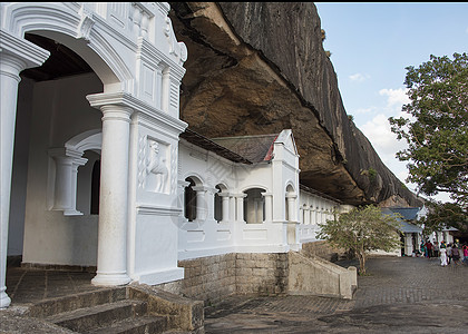 提供进入大坝洞穴的白色外墙吸引力宗教遗产寺庙历史性城市地标房子佛教徒石头图片