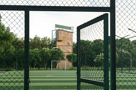 公共公园的足球场栅栏绿色竞赛运动训练体育场竞技场校园操场娱乐图片