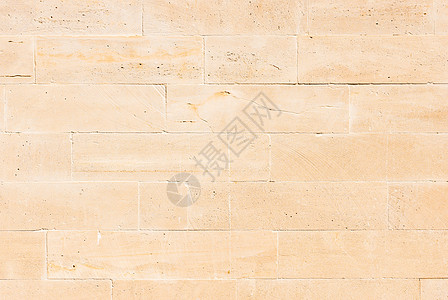 浅褐石墙背景瓷砖建造业特征乡村棕色材料建筑建筑学块状砖墙图片