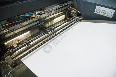 印刷机在印刷工作作坊工程报纸工具打印塑料生产金属工厂植物图片