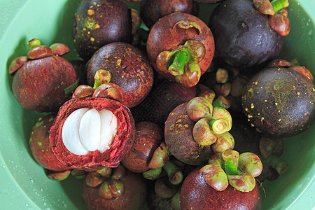 将芒果 热带水果放在桌子上情调花园果汁营养山竹紫色女王异国农业食物图片