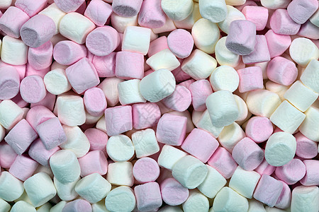 棉花糖浆甜美的本底面料味道明胶小吃软糖乐趣粉红色咖啡派对甜点糖果背景图片