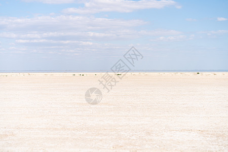 干海无尽的沙尘 美丽的云朵 美丽的风景河口海岸天线蓝色海岸线自然海景沙丘脱水海滩旅游图片