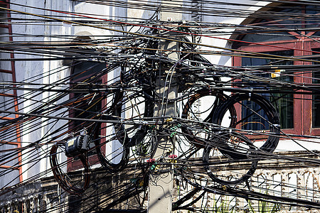 电线杆上的许多电线日光电缆高架活力纠纷绳索电话技术接线力量图片
