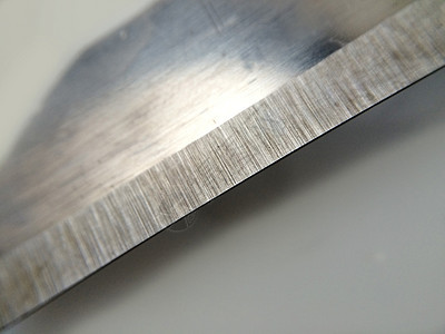 刀刃菜刀厨房帮手灰色工具背景图片