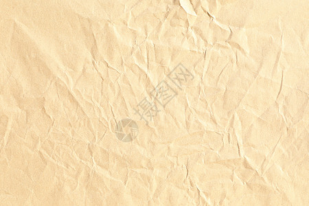 被弄皱的包装纸背景纹理黄色折痕材料白色纸板回收水平棕色床单图片